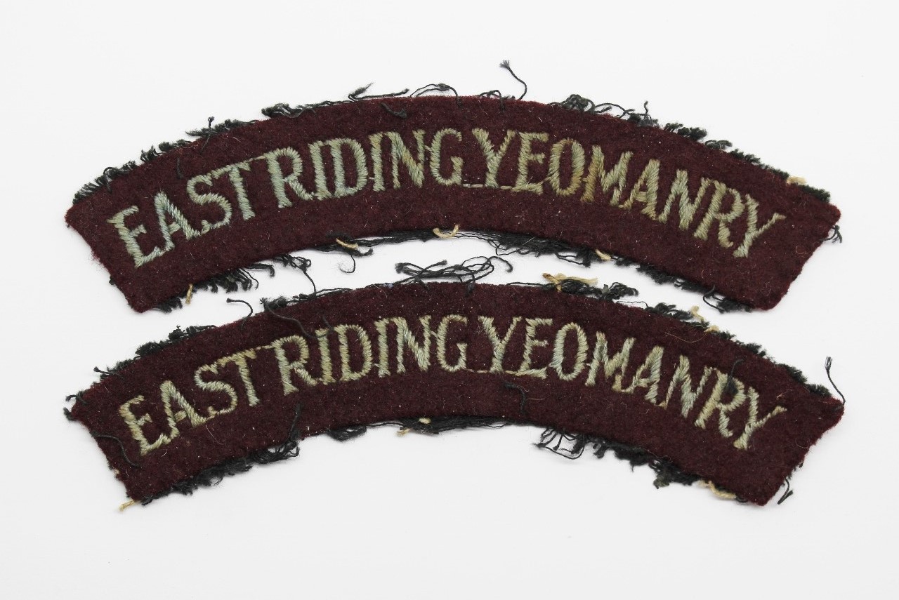 Pair of WW2 East Riding Yeomanry Cloth Shoulder Titles