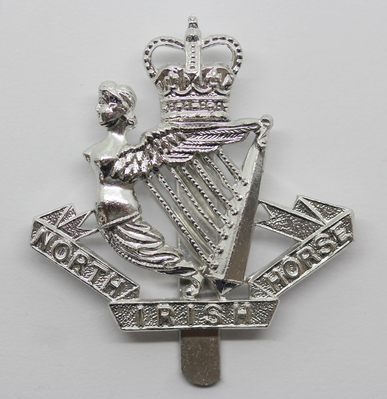 North Irish Horse Anodised (Staybright) Cap Badge - Queen's Crown