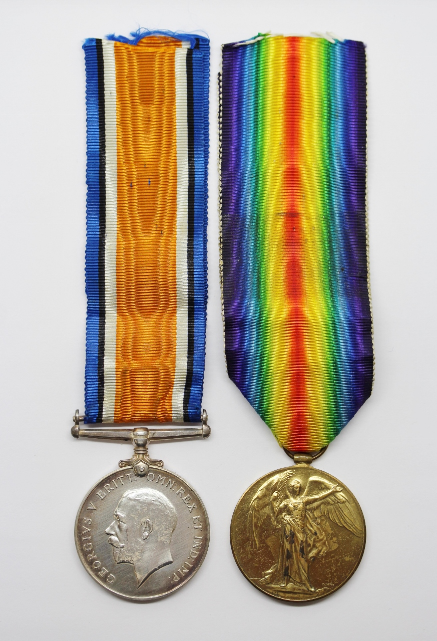 WW1 British War & Victory Medal Pair - Pte. T.R. Rowlinson, 13th Bn. Manchester Regiment