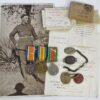 WW1 British War Medal, Victory Medal and WW2 Defence Medal with Dog Tags, Identity Bracelet and Boxes of Issue - Gnr. A.V. Bolam, Royal Artillery