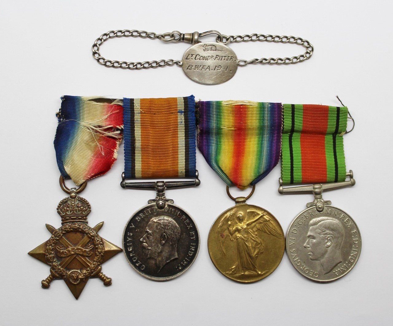 WW1 1914-15 Star Medal Trio, WW2 Defence Medal and Silver Identity Bracelet - Lt. M.A.C. Ritter, Royal Navy