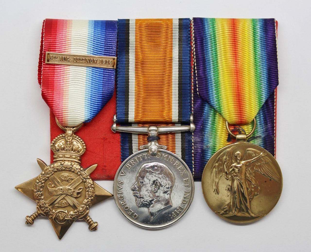 WW1 1914 Mons Star & Bar Medal Trio - Pte. H. Carpenter, 1st Grenadier Guards - Wounded